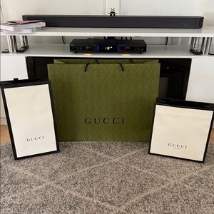 Gucci, YSL, Tory Burch, Marc Jacobs, alo store bags.